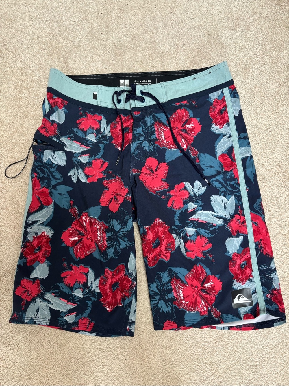 Quiksilver Navy Floral Boardshorts with Teal Waistband and Red Accents
